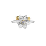 Crafted in 14KT white and yellow Certified Canadian Gold, this ring features a British Columbia dogwood flower set with a round brilliant-cut Canadian diamond