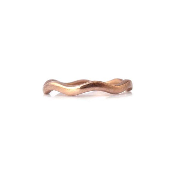 Thin band in a wave design crafted 14KT rose gold. 
