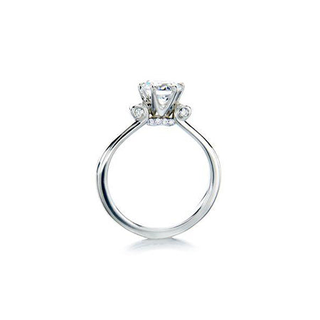 Crafted in 14KT white gold, this ring features a round brilliant-cut centre diamond and diamond details. 