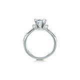 Crafted in 14KT white gold, this ring features a round brilliant-cut centre diamond on a diamond-set band. 