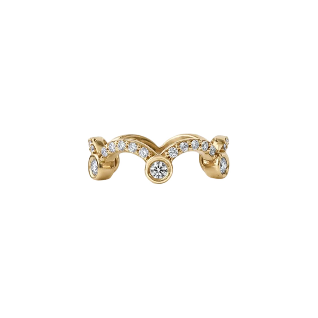 Crafted in 14KT gold, this ring is shaped like a tiara and set with round brilliant cut diamonds. 