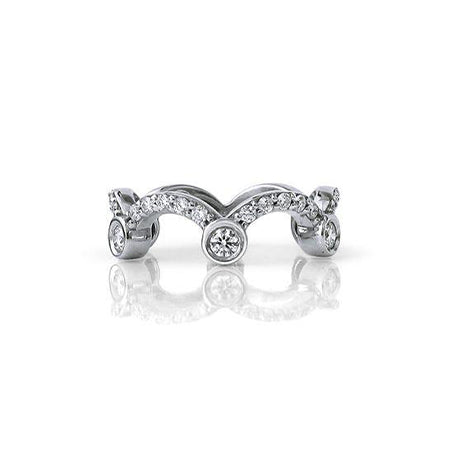Crafted in 14KT white gold, this ring is shaped like a tiara and set with round brilliant cut diamonds. 