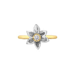 Crafted in 14KT white and yellow Certified Canadian Gold, this ring features a Manitoba prairie crocus flower set with a round brilliant-cut Canadian diamond