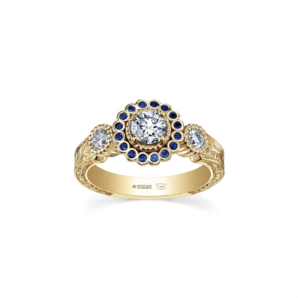 Crafted in 18KT white Canadian Certified Gold, this ring features a regal blue sapphire halo with a round brilliant-cut Canadian centre diamond on a frost-inspired hand engraved band. 