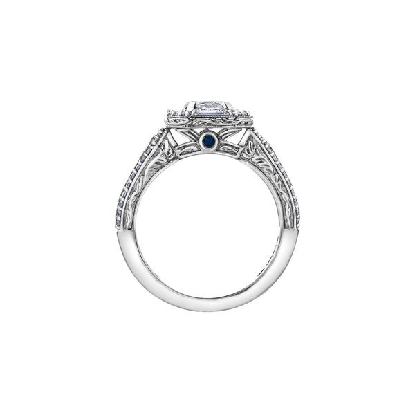 Crafted in 18kt Pure White™, this ring features an emerald-cut Canadian centre diamond framed by round and baguette-cut diamonds on a frost-inspired hand engraved band with a blue sapphire detail.